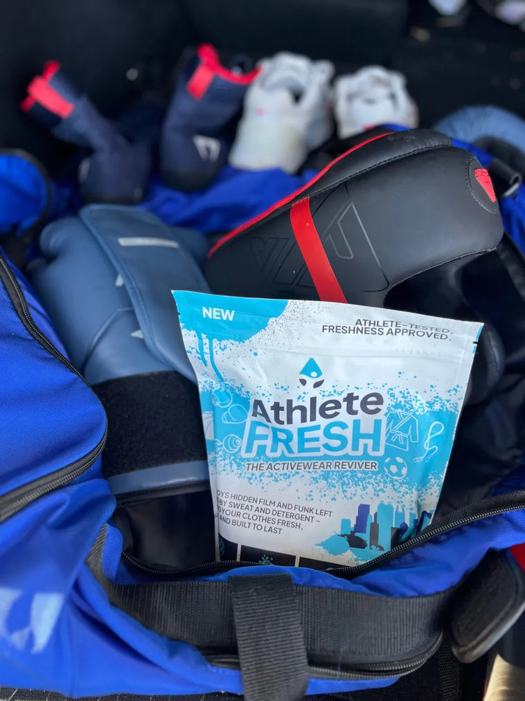 Athlete Fresh bag packed inside a real gear duffel with gloves and cleats